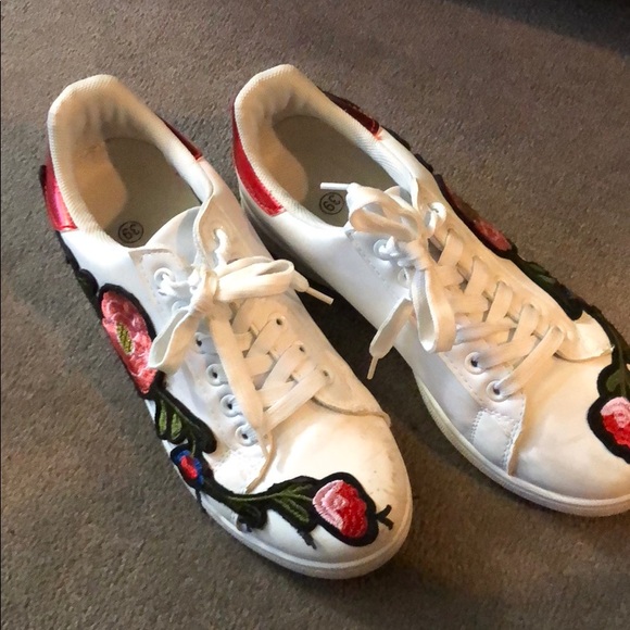 white sneakers with flowers